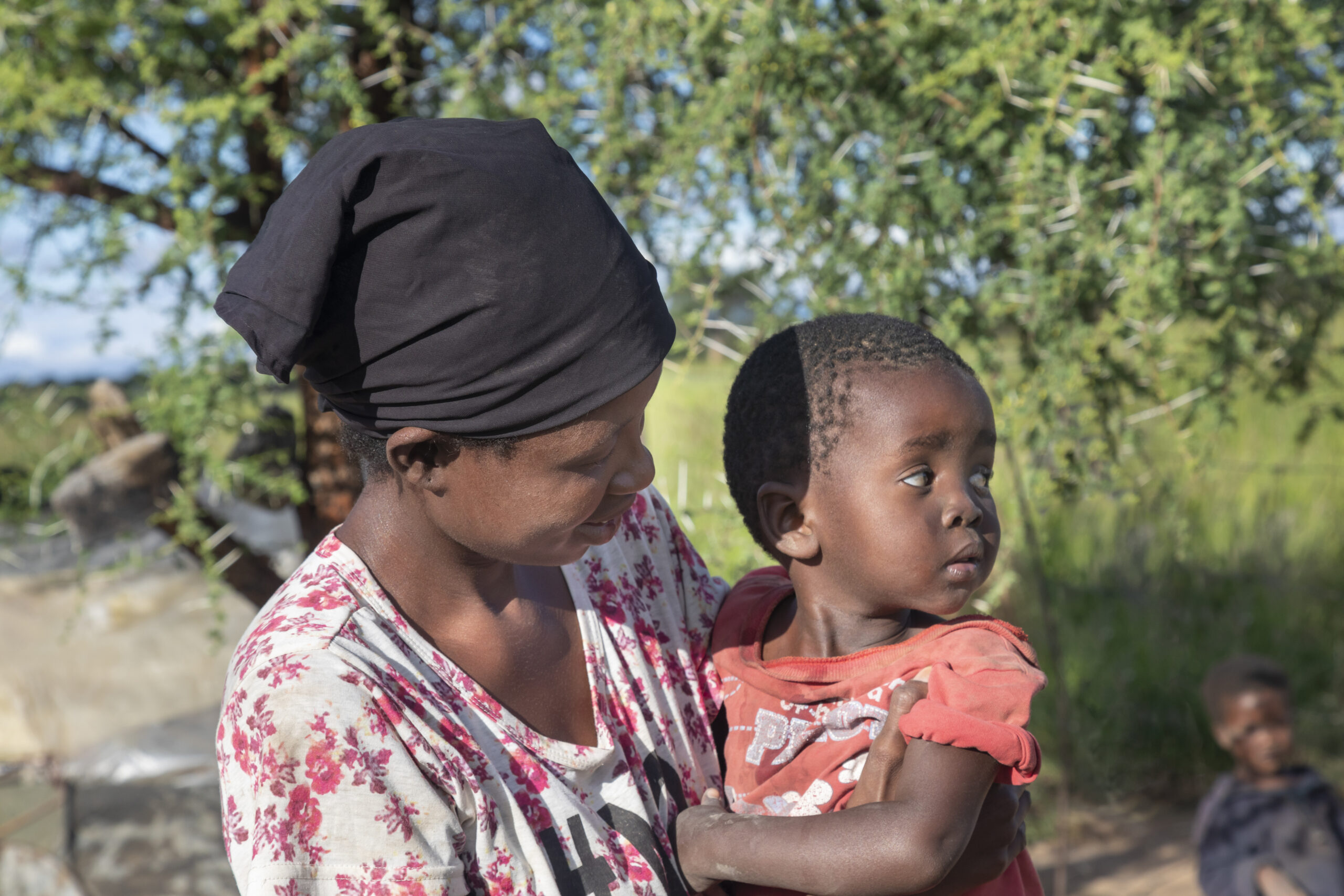 African family mother and children together in a village in Botswana